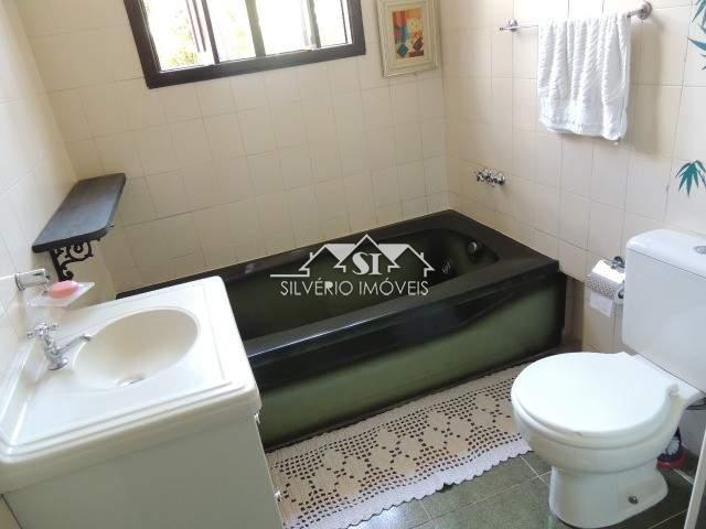 Casa à venda com 5 quartos, 335m² - Foto 7