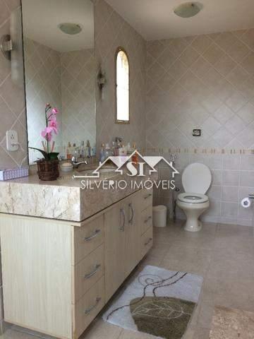 Casa à venda com 4 quartos, 334m² - Foto 9