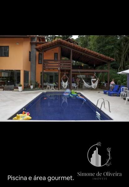 Comprar Casa em Itaipava, Petrópolis/RJ - Simone de Oliveira Imóveis